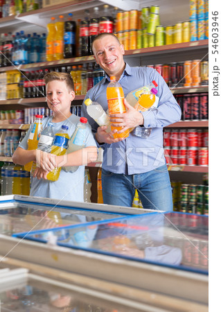 Happy father and son with purchases Happy father and son with purchases 54603946