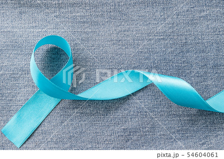 Blue ribbon symbolic of prostate cancer awareness Blue ribbon symbolic of prostate cancer awareness 54604061