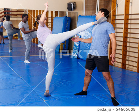 People practicing self defense techniques 54605609