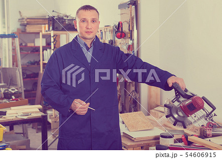 Portrait of male handsome worker in uniform 54606915