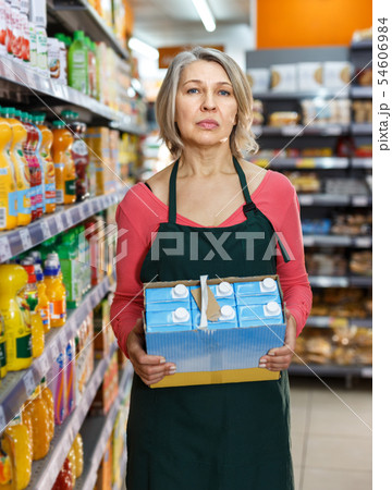 Female working in grocery Female working in grocery 54606984