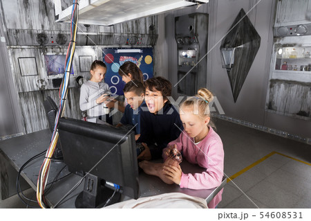 Children playing in bunker questroom 54608531