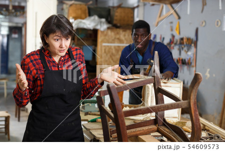 Portrait of disappointed female artisan 54609573