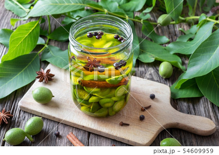Preparation of homemade nut liqueur Preparation of homemade nut liqueur 54609959