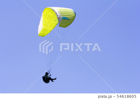 Paragliding in the blue sky as background extreme 54618605