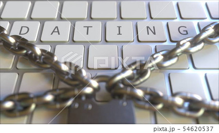 Padlock with chains on the keyboard with DATING text on keys. Conceptual 3D rendering Padlock with chains on the keyboard with DATING text on keys. Conceptual 3D rendering 54620537