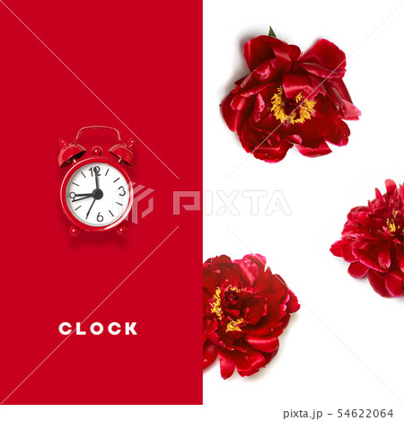 Flat lay creative morning composition of red alarm clocks pattern on gray background with space for 54622064