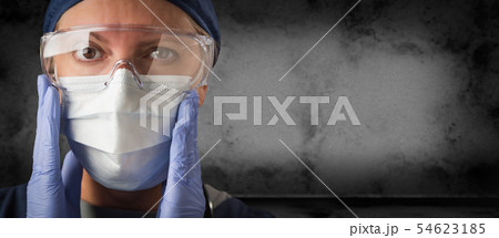 Female Doctor or Nurse in Goggles, Surgical Mask Female Doctor or Nurse in Goggles, Surgical Mask 54623185
