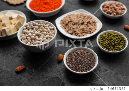 Healthy vegan food on a concrete background Healthy vegan food on a concrete background 54631345