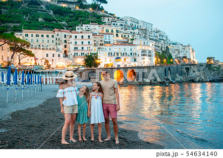 Adorable little girl on sunset in Amalfi town in Italy Adorable little girl on sunset in Amalfi town in Italy 54634140
