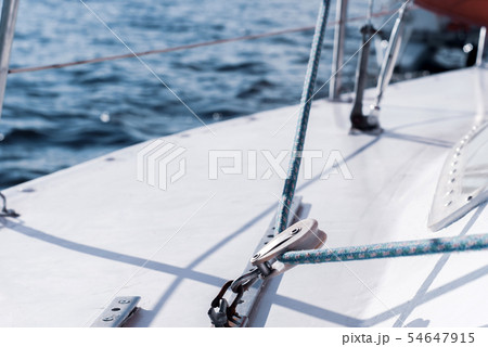 background - yachting. fragment of the hull of a background - yachting. fragment of the hull of a 54647915