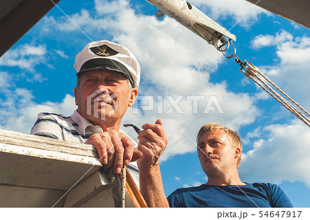 two yachtsmen aboard a yacht two yachtsmen aboard a yacht 54647917