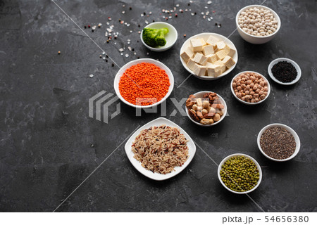 Healthy vegan food on a concrete background Healthy vegan food on a concrete background 54656380