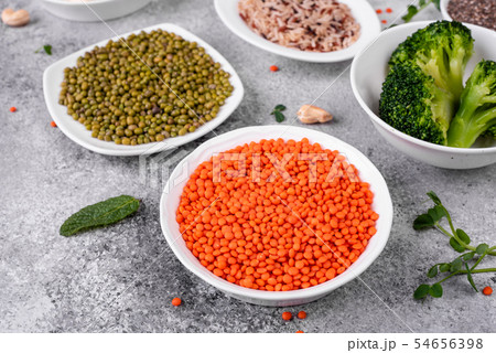 Healthy vegan food on a concrete background Healthy vegan food on a concrete background 54656398