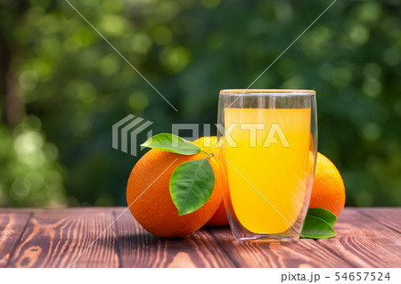 orange juice in glass 54657524