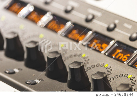 audio mixing console knobs, close up 54658244