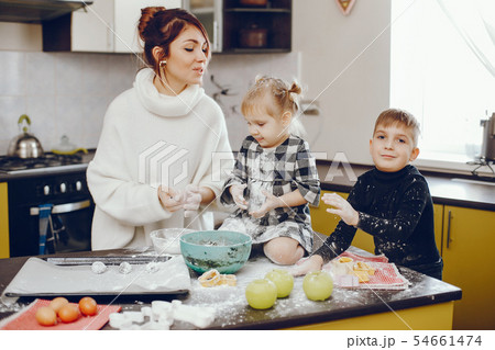 Cute family prepare the breakfest in a kitchen 54661474