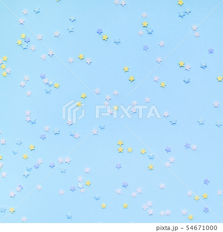 Little stars confetti on blue background Little stars confetti on blue background 54671000