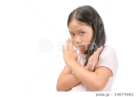 Serious cute girl showing crossed hands or Serious cute girl showing crossed hands or 54674962