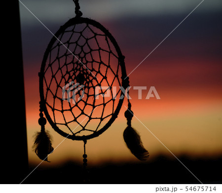 dream catcher on the background of a sunset 54675714