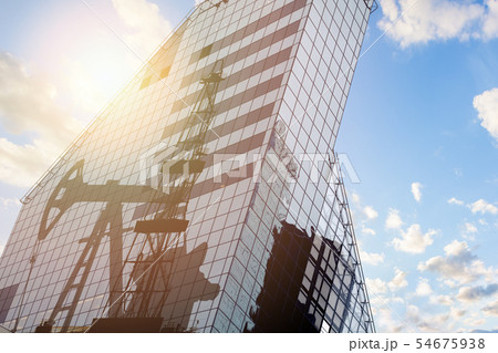 Modern office building with oil derrick Modern office building with oil derrick 54675938