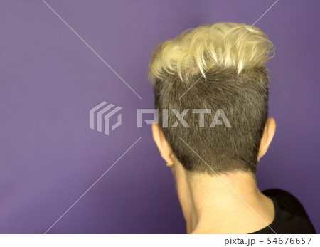 Portrait of blonde woman with short hair middle 54676657