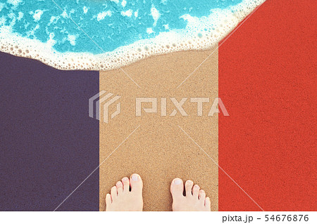 Feet on sea sand and surf. Vacation on ocean 54676876