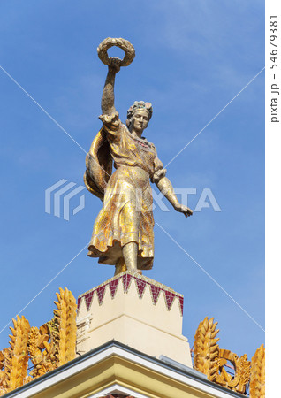 Statue of girl with wreath 54679381