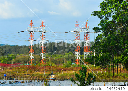 Wire electric pylon under blue sky Wire electric pylon under blue sky 54682950