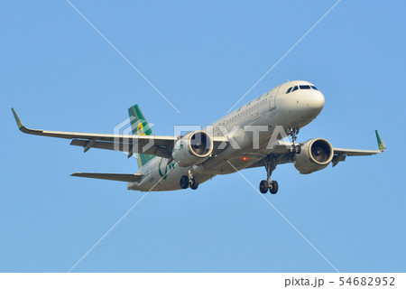 Passenger airplane landing at the airport 54682952