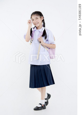 Portrait of Lovely Asian girl in school uniform Portrait of Lovely Asian girl in school uniform 54686189