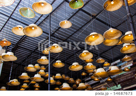 Fabricated lamp from a hat made of material bamboo 54687673