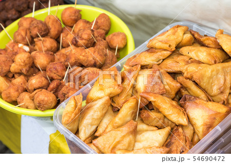 Street food - stuffed pastry 54690472