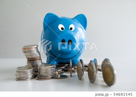 blue piggy bank saving and prevent coins pile 54691545