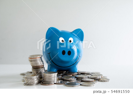 blue piggy bank saving and prevent coins pile 54691550