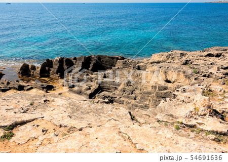 Rocky coast of Punta de n'Amer on Island Mallorca 54691636