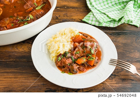 Coq au Vin, traditional French recipe of chicken Coq au Vin, traditional French recipe of chicken 54692048