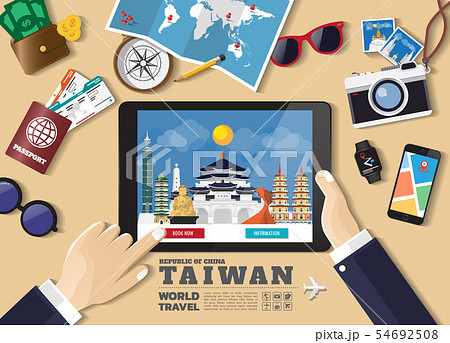 Hand holding smart tablet booking travel Hand holding smart tablet booking travel 54692508