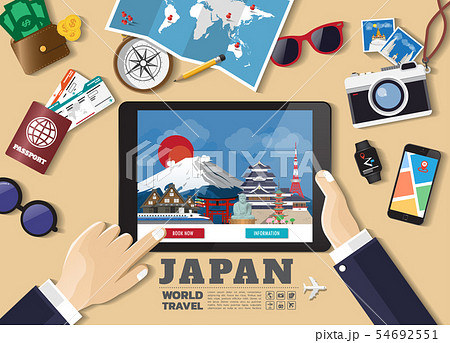 Hand holding smart tablet booking travel Hand holding smart tablet booking travel 54692551