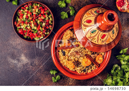 Traditional moroccan tajine of chicken with dried 54698730