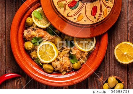 Traditional moroccan tajine of chicken with salted Traditional moroccan tajine of chicken with salted 54698733