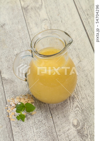Dietary vegetarian oats milk over wooden 54704296
