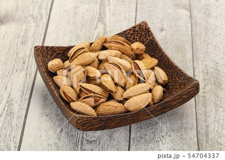 Unpeeled Almonds nuts Unpeeled Almonds nuts 54704337