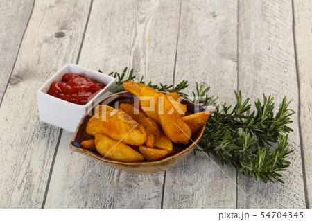 Fried potato slices Fried potato slices 54704345