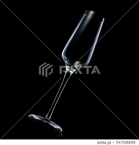 Empty luxury champagne glass isolated on a black background Empty luxury champagne glass isolated on a black background 54708890