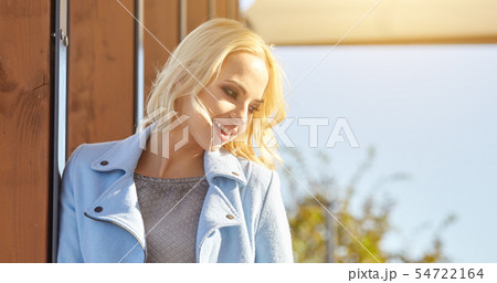 beautiful girl enjoying the sunny autumn day beautiful girl enjoying the sunny autumn day 54722164