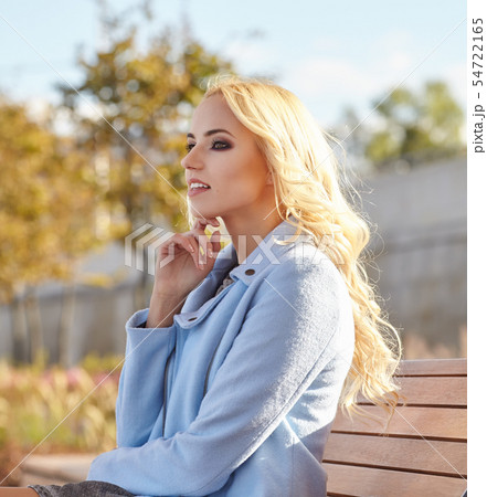 beautiful girl enjoying the sunny autumn day beautiful girl enjoying the sunny autumn day 54722165