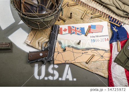 map of Normandy placed on the hood of military 54725972