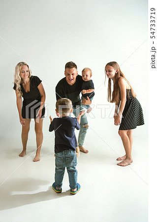 Young family spending time together and smiling 54733719