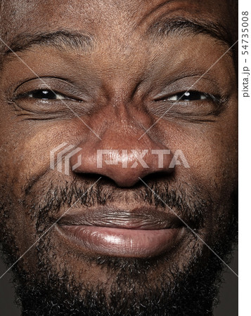 Close up portrait of young african-american man Close up portrait of young african-american man 54735008